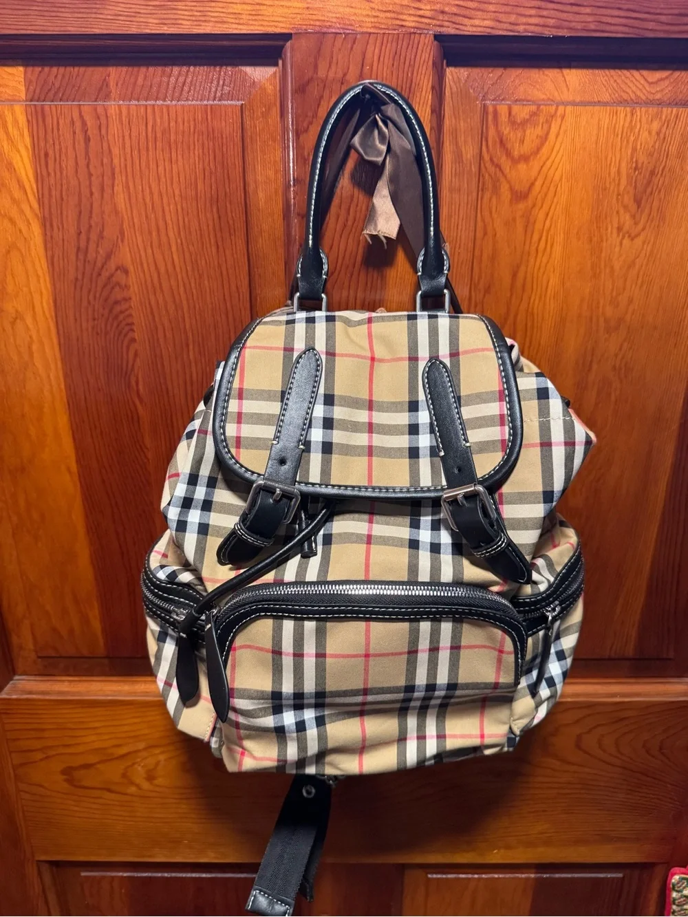 Burberry Nova Check Backpack with black trim and top handle excellent condition